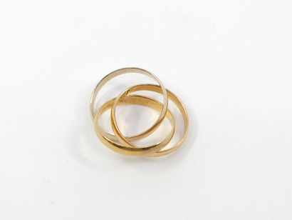 null CARTIER 
Trinity ring in three-tone 750° gold 
weight : 3,10 g 
TDD 43