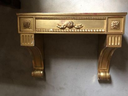 null Console en bois et stuc doré.
Style Louis XVI
Haut. : 51,5 cm ; Larg. : 60 cm...