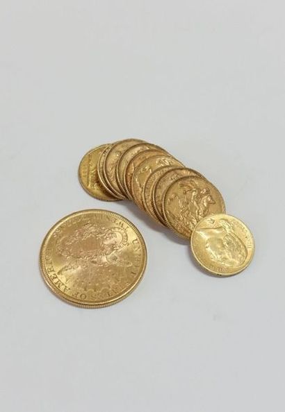 null Dix pièces de 20 FF en or et une pièce de 20 Dollars U.S en or.
Poids : 110,7...