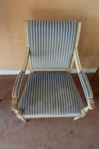 null White painted wooden armchair, backrest slightly upside down
Blue striped velvet...