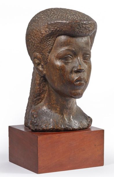 null LORETTE - School of the 20th century.
Bust of an African woman.
Patinated plaster....