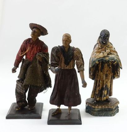 null Meeting of three topics: 
- Two wax figures. Top. : 25 and 26 cm.
- Saint Maurice...