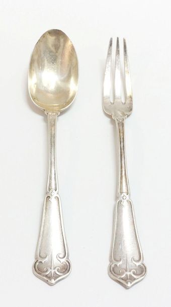 null Covered in silver, engraved Marthe.
Weight: 94.1 g. 
 A silver cutlery, shell...