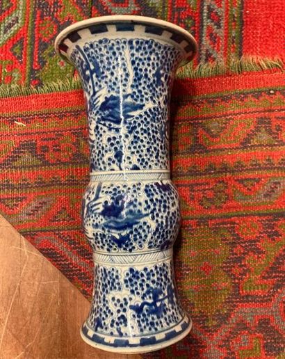 null CHINA 
Pair of blue and white decorated porcelain scroll vases
(one of the necks...