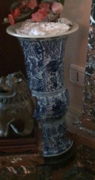 null CHINA 
Pair of blue and white decorated porcelain scroll vases
(one of the necks...