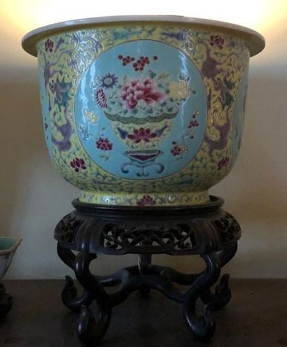 null CHINA 
Glazed porcelain planter with turquoise and yellow backgrounds decorated...