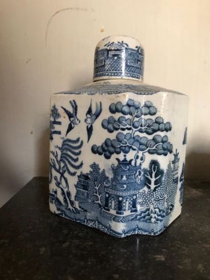 null Fine earthenware bottle with blue-white decoration of birds and branches near...