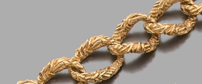 Bracelet articulé en or jaune 750 millièmes,...