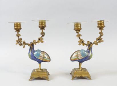 null CHINA - 18th-19th century.

A pair of bronze and polychrome cloisonné enamelled...