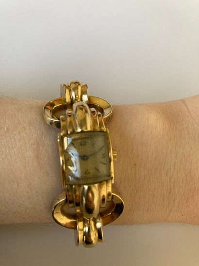 null Montre bracelet de dame en or jaune 750 millièmes, la montre de forme carrée,...