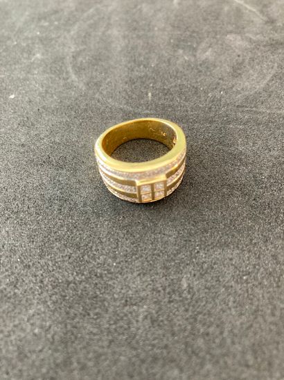 null Ring ribbon in yellow gold 750 thousandths decorated in the center with four...
