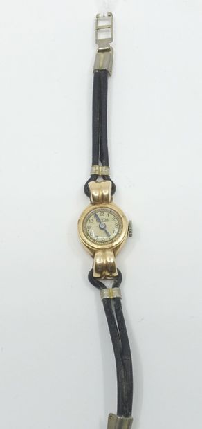 null Montre bracelet de dame, la montre de forme ronde en or jaune 750 millièmes,...