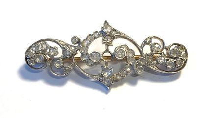 null Brooch in platinum 850 thousandths and gold 750 thousandths with decoration...