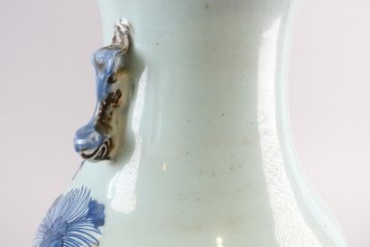 null Baluster vase with celadon background and floral decoration in blue monochrome.

Height...