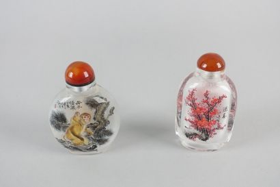 null Meeting of two covered snuffboxes in painted glass

Height : 8,4 and 8,6 cm...