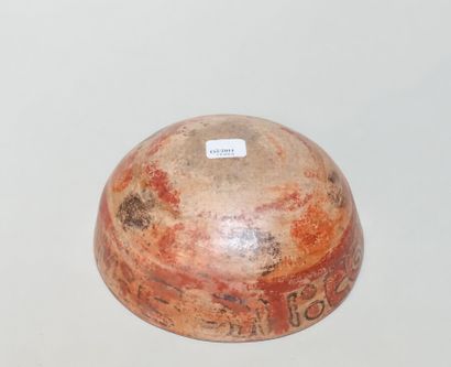 null Ceremonial bowl with glyph decoration

Brown terracotta with red, orange and...