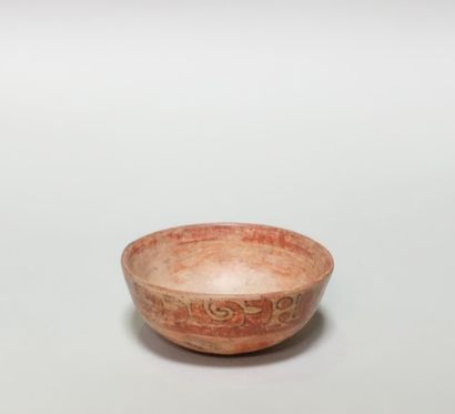 null Ceremonial bowl with glyph decoration

Brown terracotta with red, orange and...
