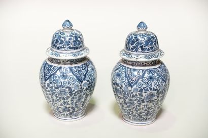 null DELFT

Pair of small covered earthenware pots, the body with a gadroon, decorated...