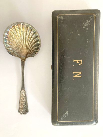 null A silver spoon for strawberries (Minerve mark), the spatula monogrammed F.N.

Weight...