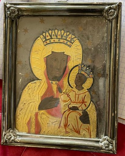 null Virgin and Child

Fixed under glass in a silver plated metal frame 

Height...