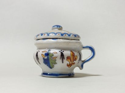 null Covered sugar bowl in polychrome earthenware decorated with lilies and stylized...