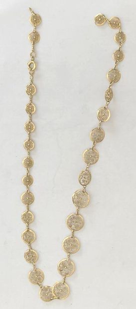 null Articulated necklace in yellow gold 750 thousandths, the links of round form...