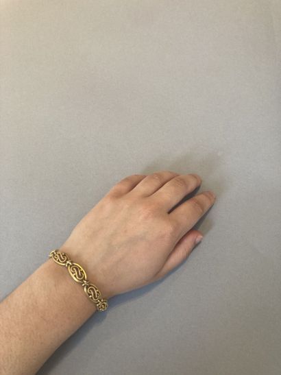 null Bracelet à mailles losangiques en or jaune 18k (750 millièmes) à décor central...