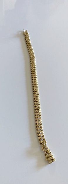 null Bracelet articulé en or jaune 750 millièmes, les maillons doubles entrelacés.

(Usures...
