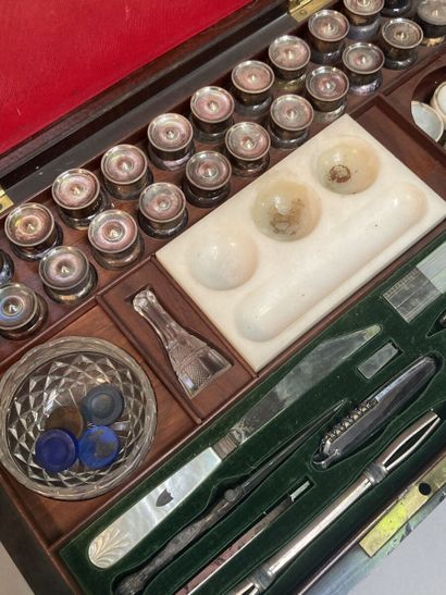 null Mahogany watercolorist's case containing a multitude of compartments with silver...