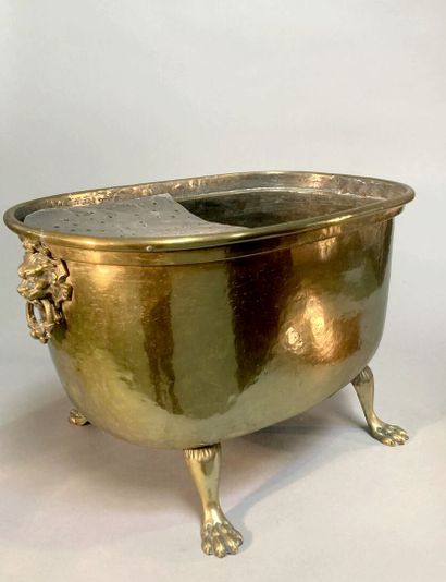 null Brass brazier in the form of a bathtub in the antique style resting on four...