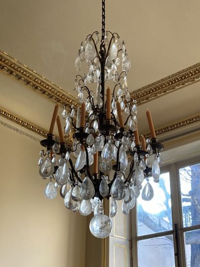 null Chandelier in gilt bronze and rock crystal with twelve arms of light, pendants,...