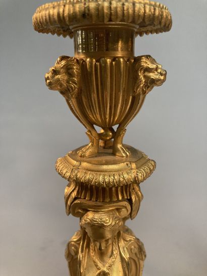 null Pair of ormolu torches in the taste of Jean-Démosthène Dugourc, the shaft with...