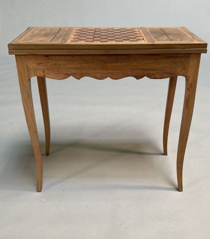 null Fruitwood game table with folding top and sliding base, resting on cambered...