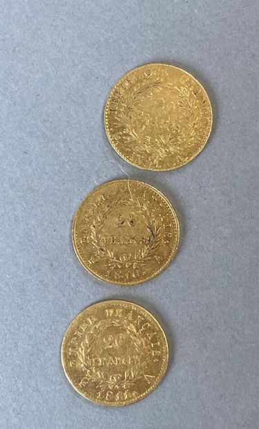 null Trois pièces de 20 F or :

- Napoléon lauré 1810

- Bonaparte Premier Consul...