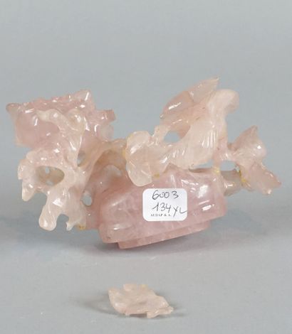 null CHINA 

Pink jadeite in the form of a flattened vase on which is posed a branch...