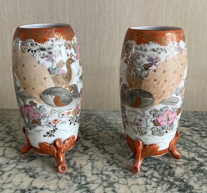 null JAPAN 

A pair of small tripod porcelain vases in the Satsuma style decorated...