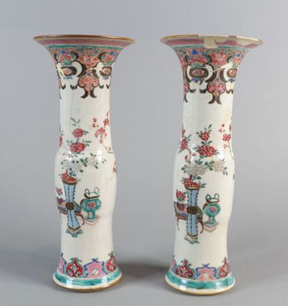 null CHINA 

Pair of porcelain vases in Famille Rose enamels decorated with flowering...