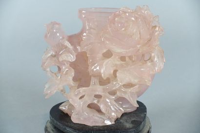 null CHINA 

Pink jadeite in the form of a flattened vase on which is posed a branch...