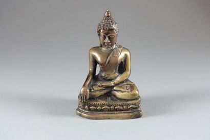null THAILANDE - XIXe siècle

Statuette de bouddha Maravijaya en bronze à patine...