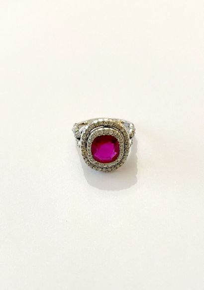 null Ring in platinum 850 thousandths, the center adorned with a cushion ruby set...