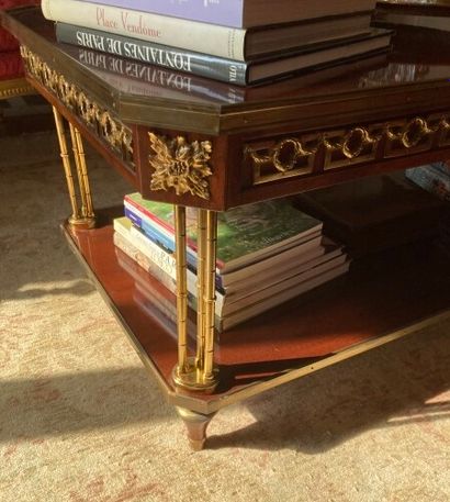 null Coffee table with two trays in mahogany veneer, the triple uprights in gilded...