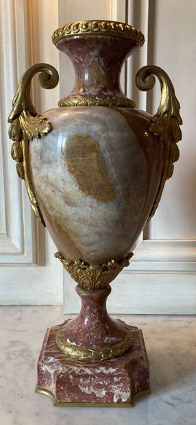 null Pair of baluster vases in red veined marble stone, the gilt bronze mount decorated...