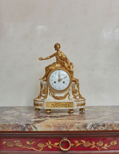 null Pendule en bronze doré et marbre blanc à décor de Vénus et l'Amour ; (accidents...