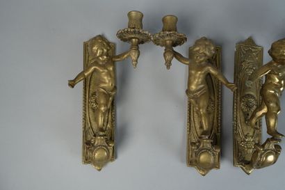 null Lot including:
- Two pairs of wall sconces decorated with cherubs
Height 27...