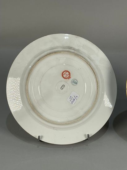 null Two polychrome porcelain plates decorated with galant scenes
Diameter: 22 and...