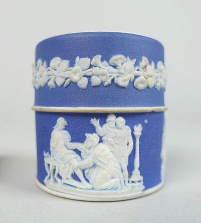 null WEDGWOOD
Two covered boxes with relief decoration on a blue background, one...