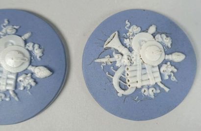 null WEDGWOOD
Two small circular medallions decorated with trophies, musical instruments...