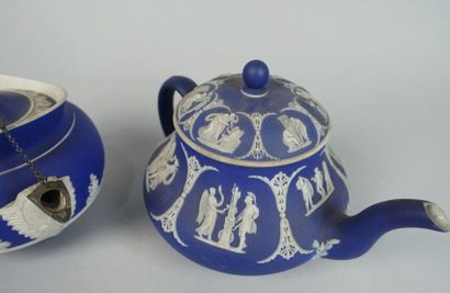 null WEDGWOOD
Set of three teapots, two covered, decorated with antique cameo scenes...