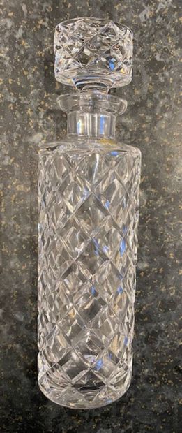 null Cut crystal liqueur service including a covered carafe and six glasses.