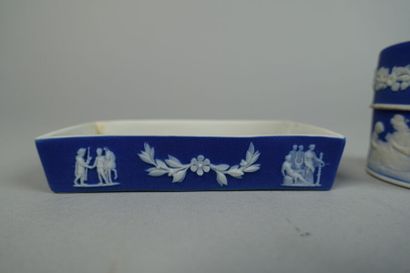 null WEDGWOOD
Two covered boxes with relief decoration on a blue background, one...